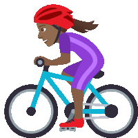 a person wearing a red helmet is riding a bike