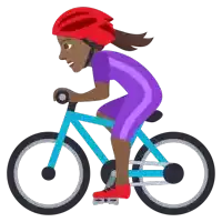 a person wearing a red helmet is riding a bike