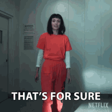 a woman in a red jumpsuit says that 's for sure netflix