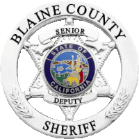 a blaine county senior deputy sheriff badge is shown