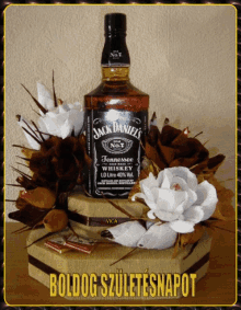 a bottle of jack daniel 's tennessee whiskey on top of a box