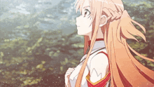 a girl with long hair is standing in front of a forest and looking up at the sky .