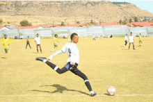 a soccer player with the number 9 on his shirt is kicking the ball