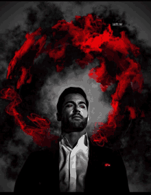 a man in a suit with red eyes is surrounded by red smoke and the word lucifer is on the bottom