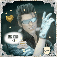 a picture of ignis de leo with a cup of coffee next to him