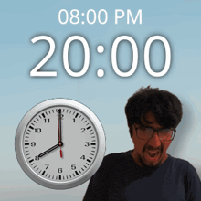 a man with glasses is standing in front of a clock that says 20:00