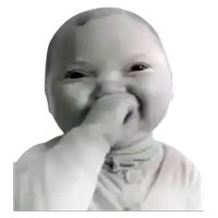 a baby is smiling and covering his mouth with his hand .