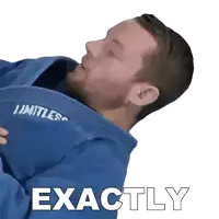 a man wearing a blue kimono with the word exactly on it