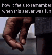 a close up of a person 's hand pointing at something with the words `` how it feels to remember when this server was fun ''