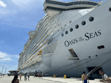 a large cruise ship called oasis of the seas is docked