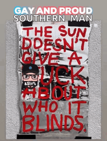 a poster that says gay and proud southern man the sun doesn 't give a fuck about who it blinds