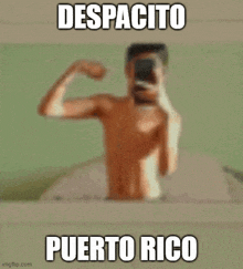 a shirtless man is flexing his muscles in front of a mirror with despacito puerto rico written on the bottom