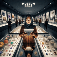 a woman in a hijab is looking at an apple tablet in a museum