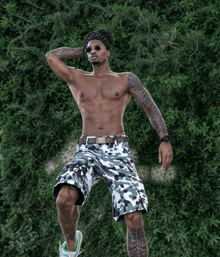 a shirtless man with tattoos on his arms and legs