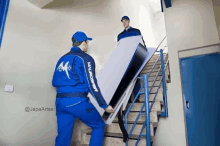 a man in a blue uniform with the word microsoft on it