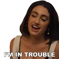 a woman says " i 'm in trouble " in front of a white background