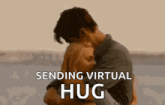 a man and a woman are hugging each other with the words `` sending virtual hug '' .