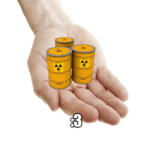 a hand is holding three yellow barrels with the number 3 on the bottom