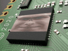 a picture of a man 's face is on a circuit board with the year 2020