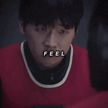 a close up of a man 's face with the word feel written on it