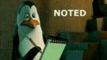 a penguin is writing on a notepad with the word noted behind it