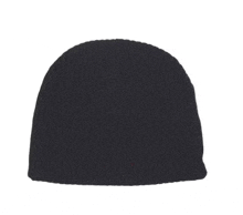 a black beanie hat is sitting on top of a white surface .