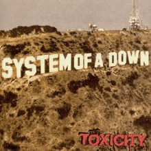 the cover art for the album system of a down toxicity