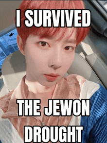 a man with red hair is sitting in a car with a meme that says i survived the jewon drought