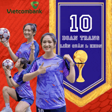 a poster for vietcombank shows a woman holding a soccer ball