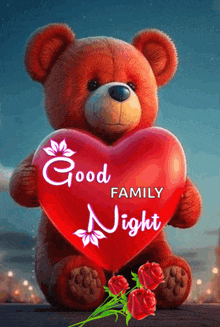 a teddy bear is holding a red heart with the words good family night written on it .