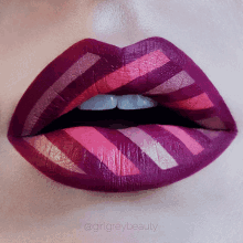 a close up of a woman 's lips with purple and pink lipstick and the caption @girlgreybeauty