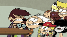 a group of cartoon characters are standing around a table with their mouths open