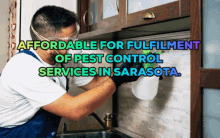 a man spraying a wall in a kitchen with the words affordable for fulfilment of pest control services in sarasota