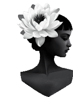 a black and white portrait of a woman with a flower in her hair