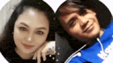 a man and a woman are sitting next to each other in a heart shaped frame .