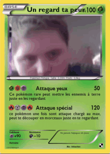 a pokemon card with a man 's face on it