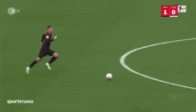 a soccer player with the number 4 on his jersey is kicking the ball