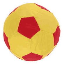 a yellow and red soccer ball is sitting on a white surface