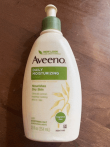 a bottle of aveeno daily moisturizing lotion on a table