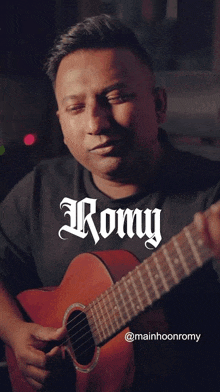 a man playing a guitar with the name romy written on the bottom