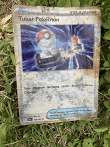 a pokemon card that says tukar pokemon on it