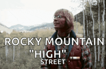 a poster for rocky mountain high street shows a man in a plaid shirt smoking a cigarette