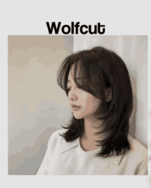 a picture of a woman with a wolfcut haircut