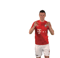 a man wearing a red t-mobile shirt is making a funny face