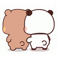 a couple of bears standing next to each other .