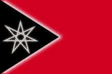 a red and black flag with a white star in the middle