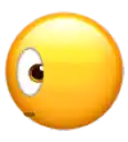a close up of a yellow smiley face with a white eye .