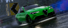 a green alfa romeo is driving down a road in the rain