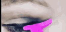 a close up of a woman 's eye with a pink lipstick on it