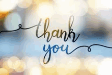 a thank you card with a blurry background and the words `` thank you '' written in cursive .